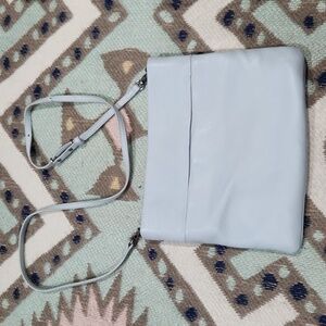 The sak blue/dove grey adjustable crossbody